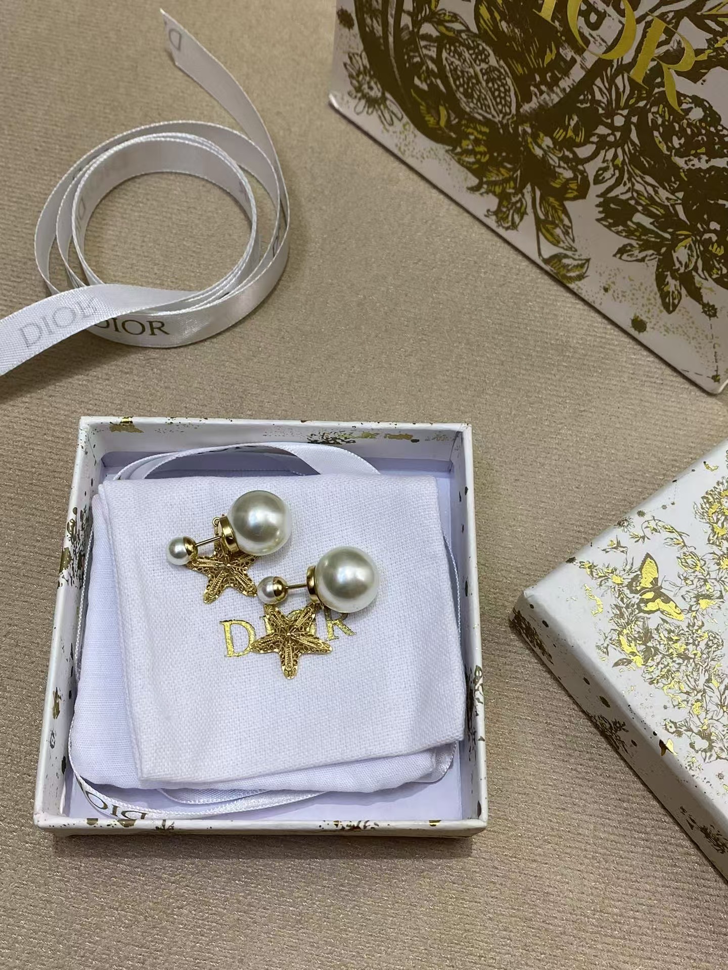 Veloura Pearl Star Charm Earrings